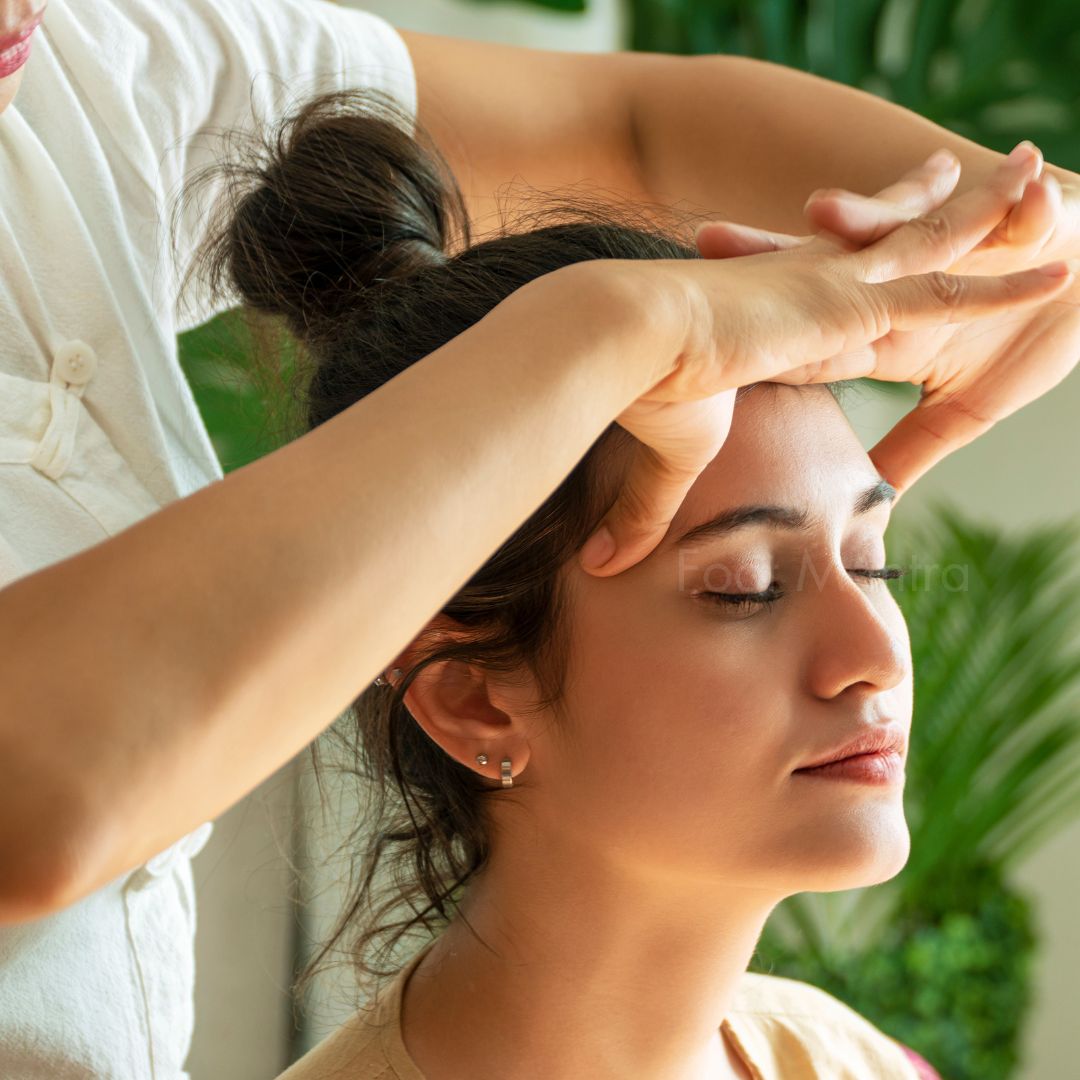 Woman receiving a relaxing head, neck and shoulder massage